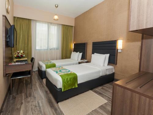 דובאי Oasis Deira Hotel מראה חיצוני תמונה