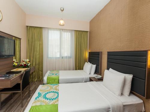 דובאי Oasis Deira Hotel מראה חיצוני תמונה